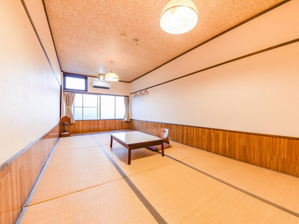 Отель Ryokan Marue Honkan Хитоёси Экстерьер фото